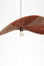Dual colour Raffia Pendant Lamp showing reddish and natural-toned shade sections with a visible central bulb.