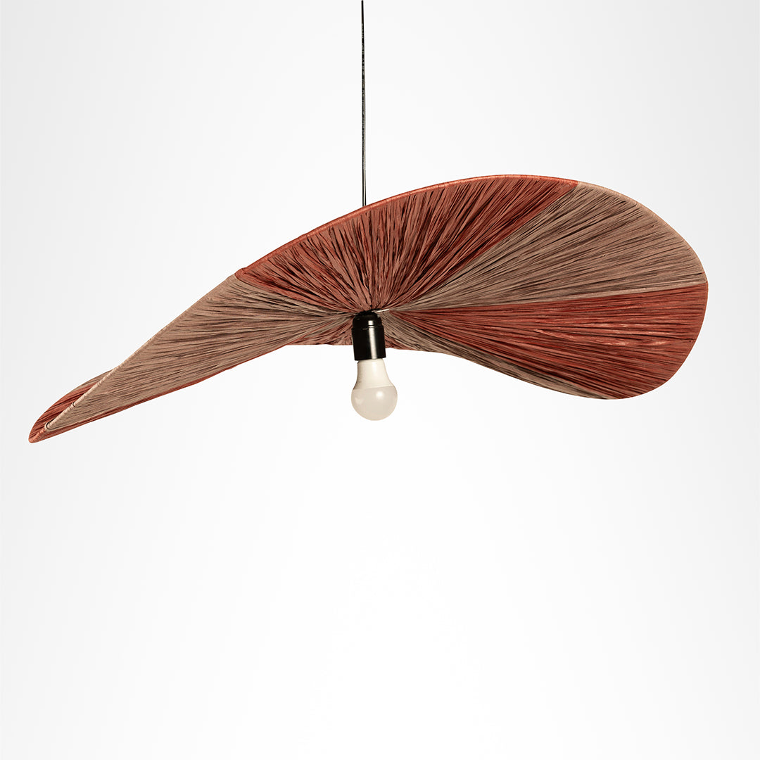 Dual colour Raffia Pendant Lamp showing reddish and natural-toned shade sections with a visible central bulb.