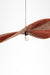 Raffia Pendant Lamp in Dual colour, with alternating reddish and natural-toned sections across its folded paper shade.