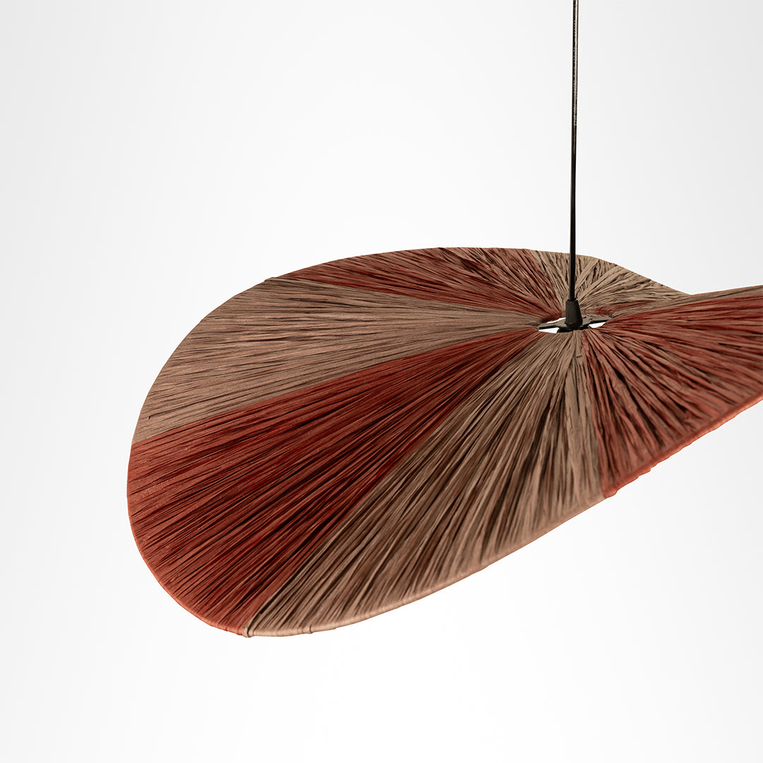 Dual colour Raffia Pendant Lamp from above, showing alternating reddish and natural-toned folds around the suspension point.