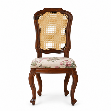 Front view of Louis Dining Chair No.5 with a walnut-finished mango wood frame, cane back and floral upholstered seat.