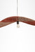 Dual colour Raffia Pendant Lamp in side view, showing its low curved profile and central bulb.