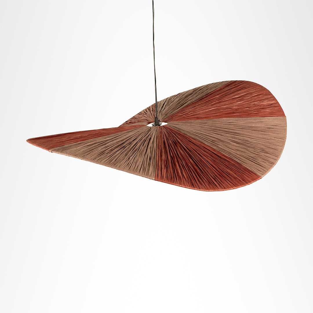 Dual colour Raffia Pendant Lamp in an alternate top view, showing reddish and natural-toned sections across the curved shade.