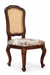 Three-quarter view of Louis Dining Chair No.5 with a cane back panel, walnut-finished mango wood frame and floral upholstered seat.
