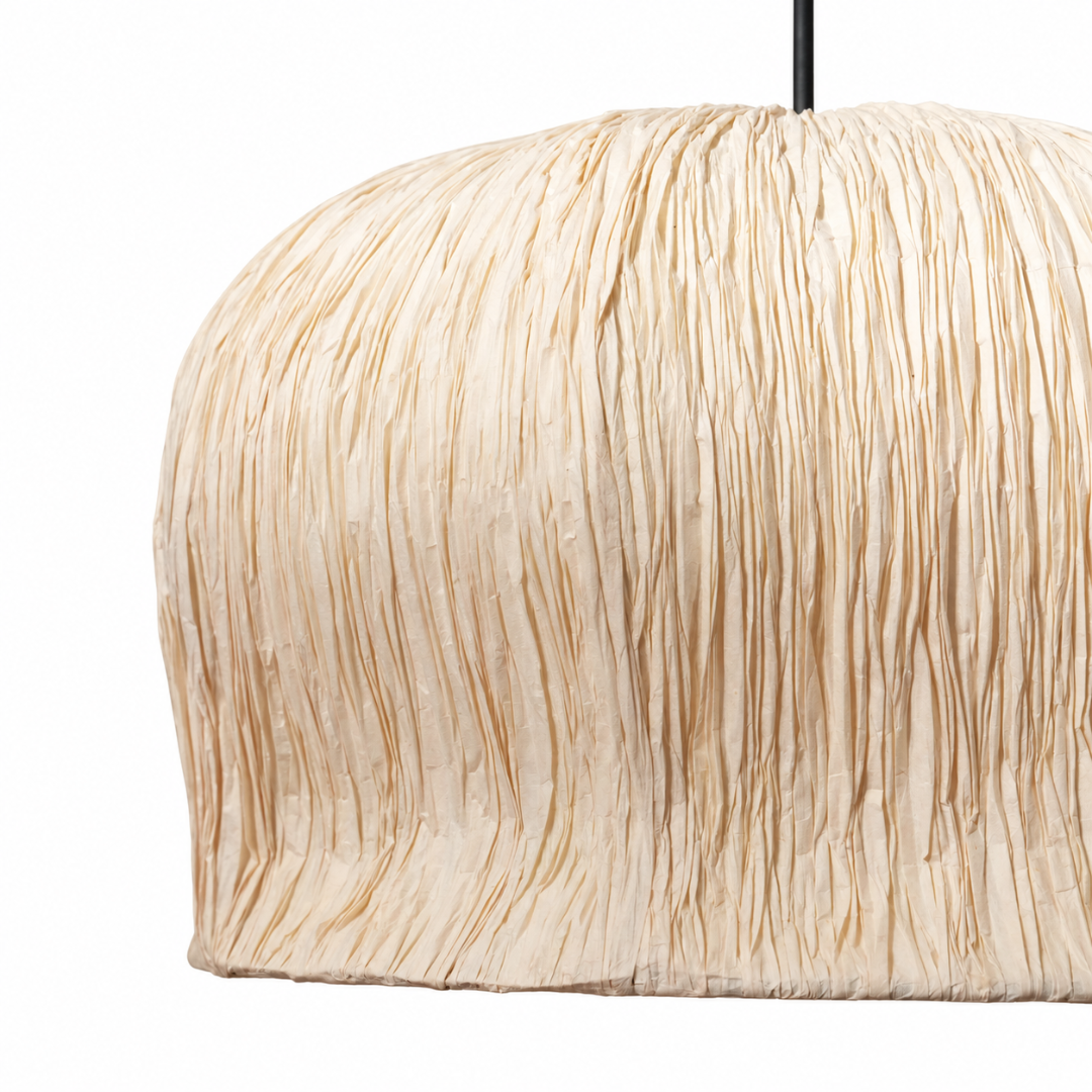 Close-up of Papyrus Bellflower Pendant Lamp, showing the gathered folds of its pale paper shade.