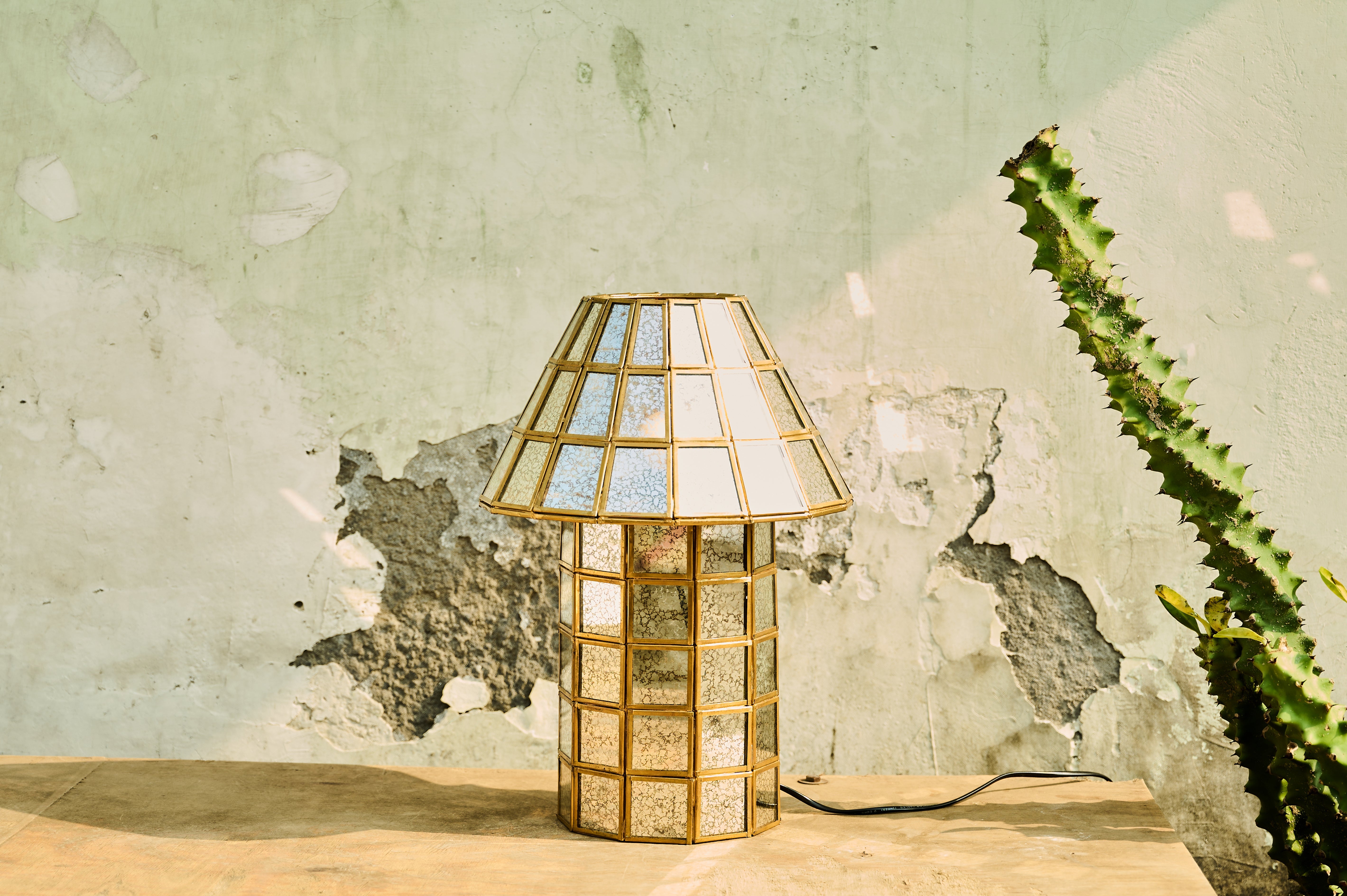 Brass-Aged Table Lamp wide view on a wooden surface