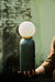 Moon Table Lamp held in a hand