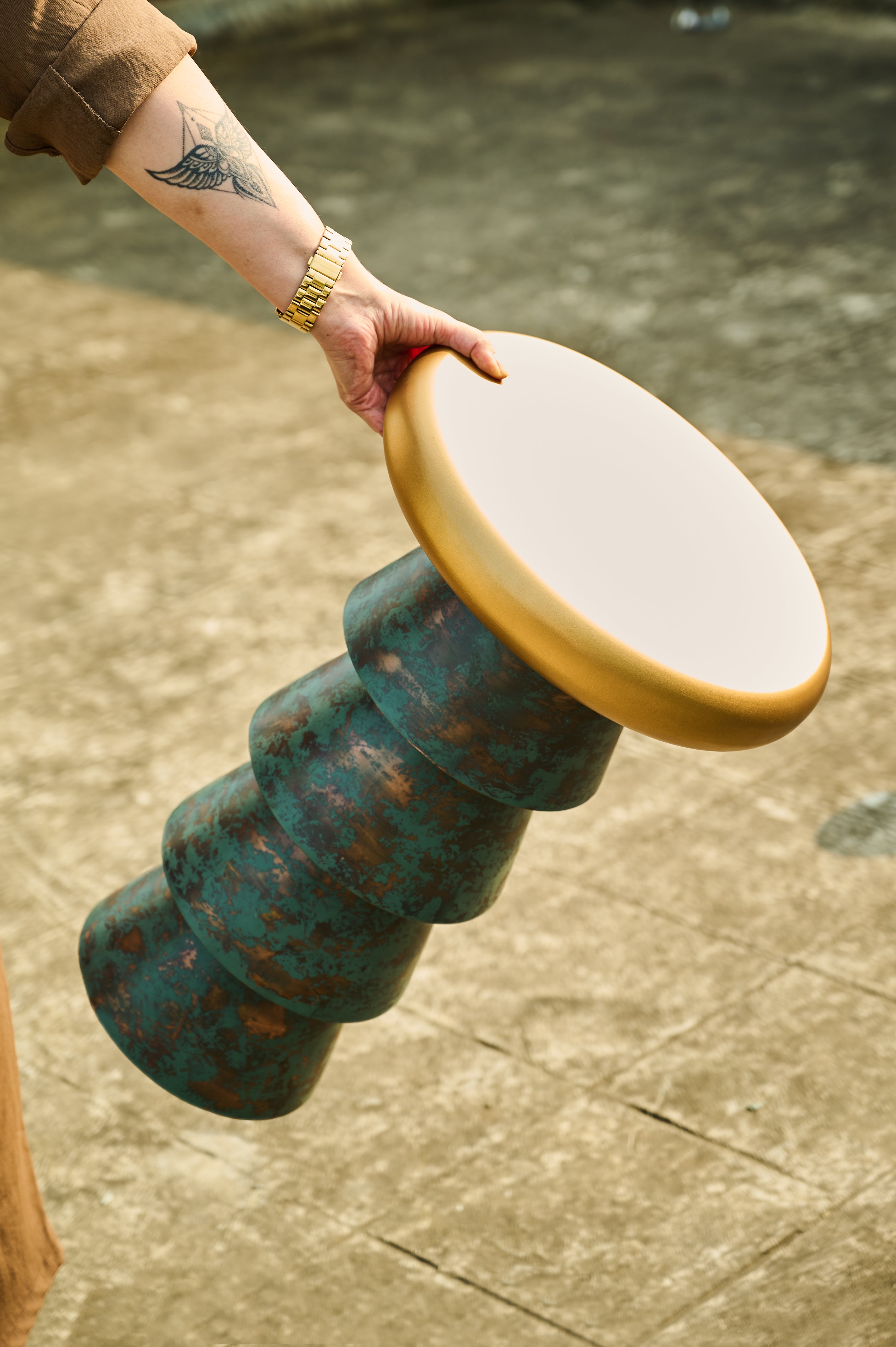 Bucket Drink Table being carried by the top
