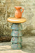 Bucket Drink Table wide view beside a textured wall
