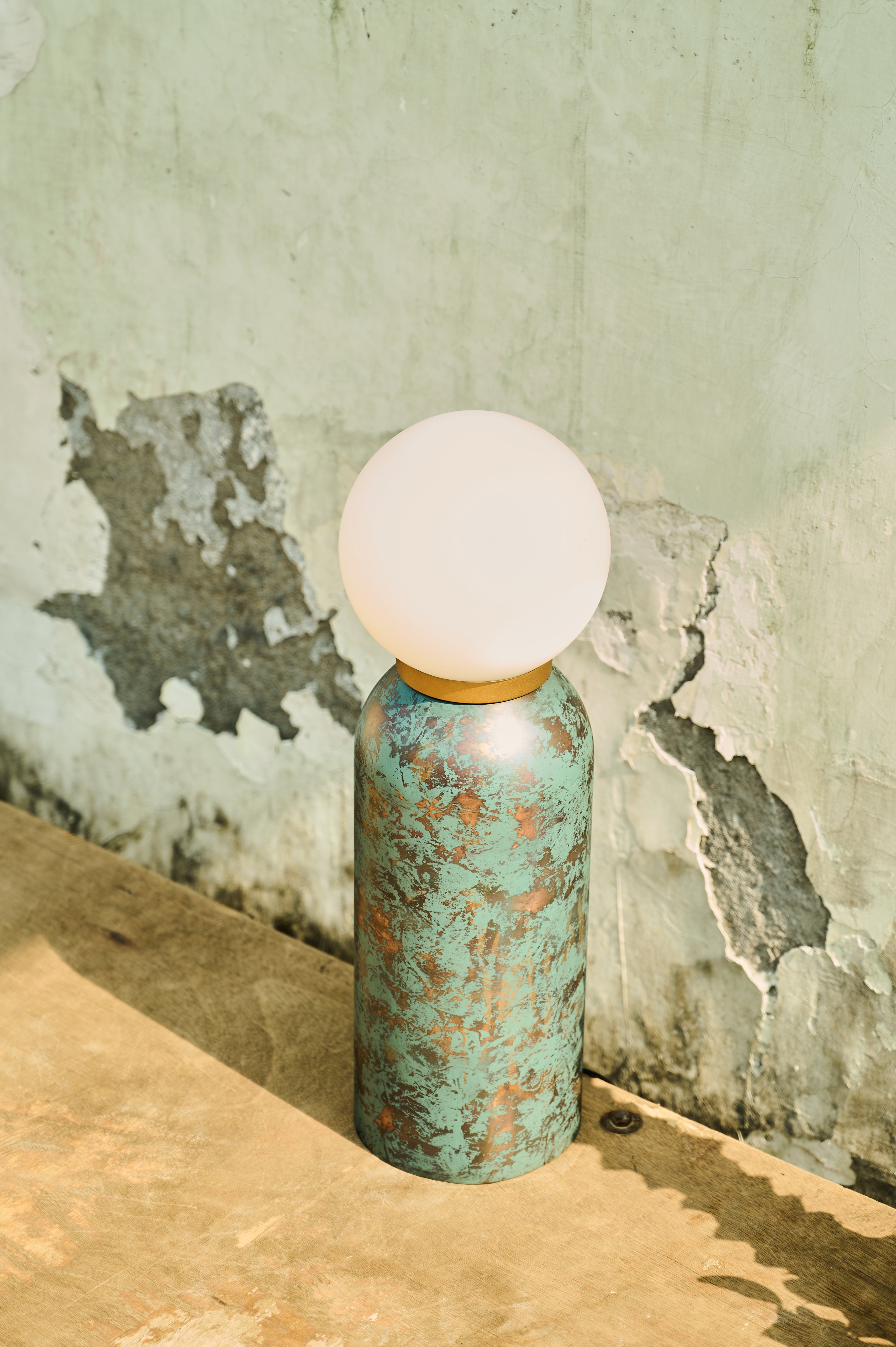 Moon Table Lamp angled view on a wooden surface
