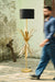 Palmette Floor Lamp beside a person for scale