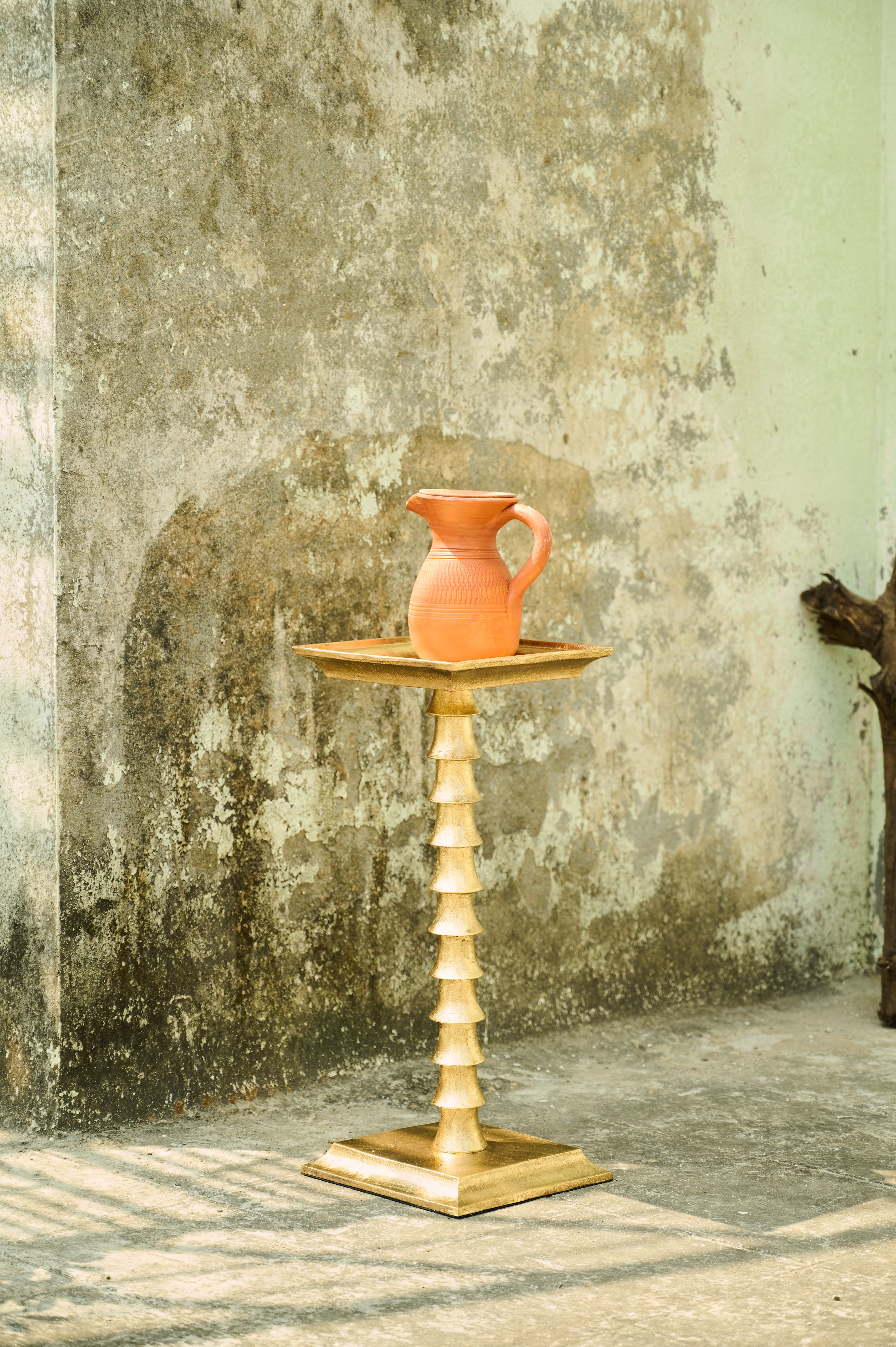 Trunk Drink Table angled full view with a jug