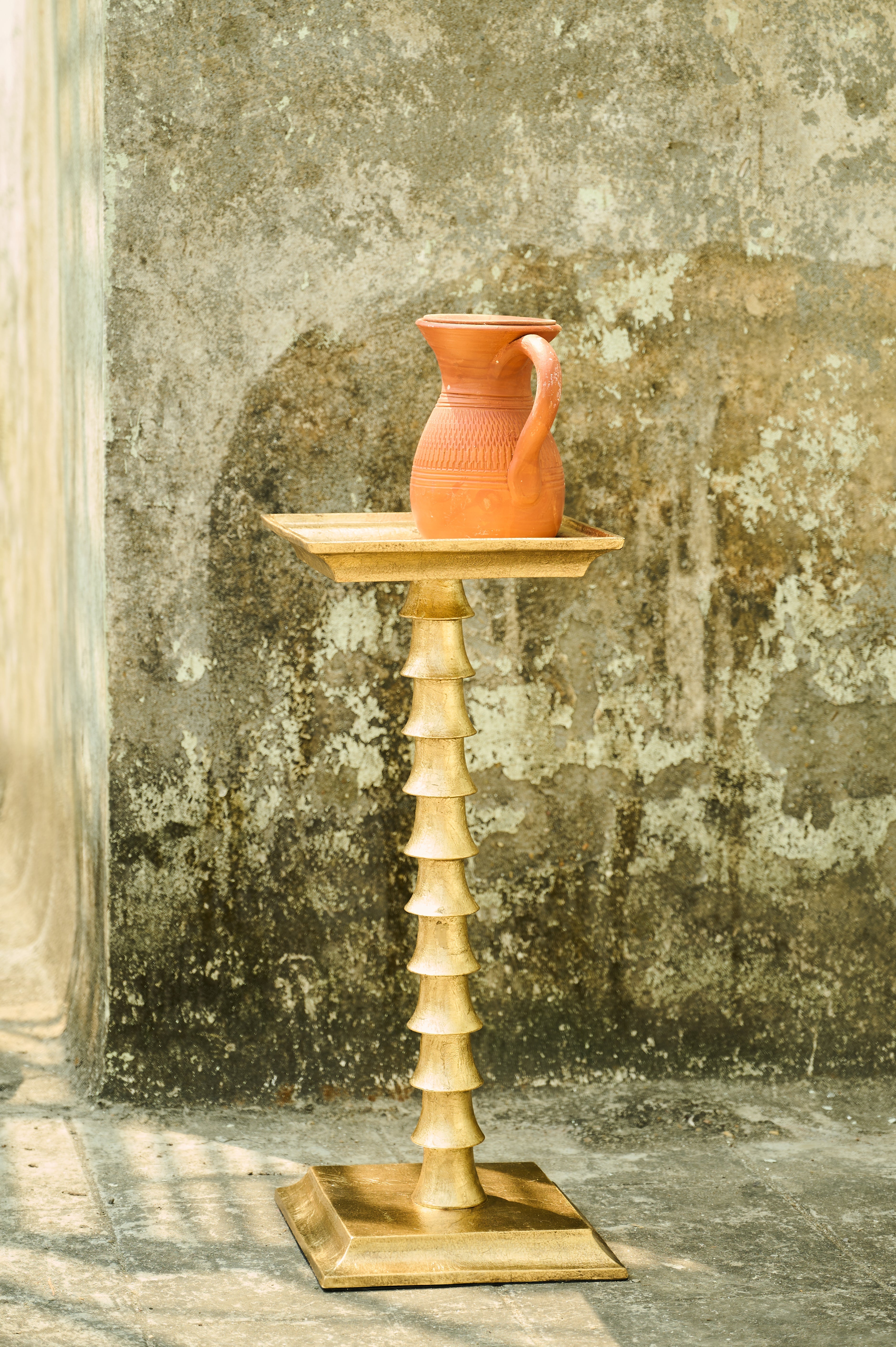 Trunk Drink Table with a jug on its top