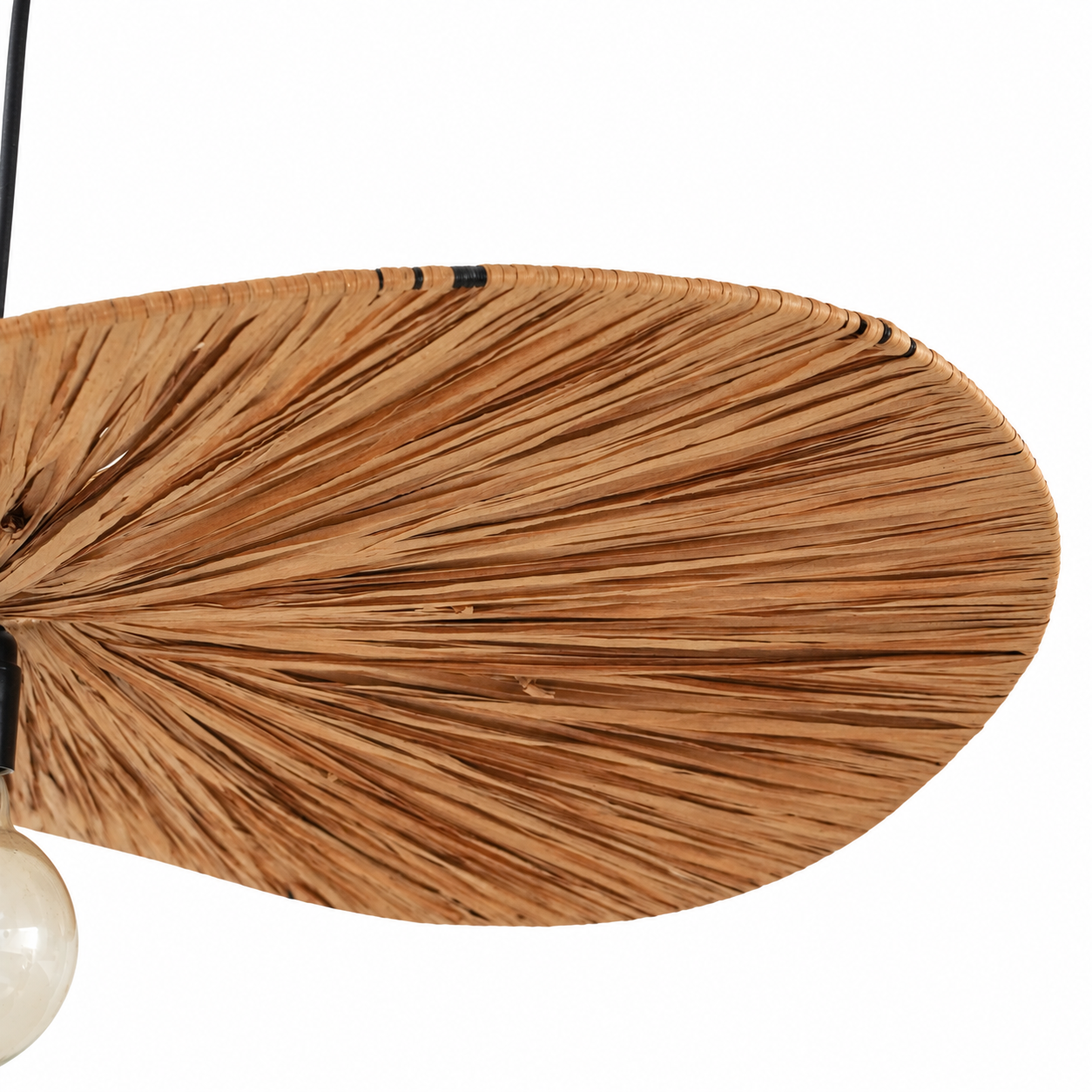 Close-up of the Standard Raffia Pendant Lamp, showing fine folds across the natural-toned paper shade.