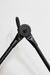Adjustable wall lamp that pivots and extends, offering flexible lighting for reading or ambient use.