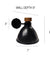 Modern black wall lamp featuring a conical shade and a wooden accent knob, mounted on a horizontal arm and round base. Ideal for adding a touch of elegance and functionality to any room.