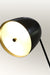 Black floor lamp compatible with energy-saving LED bulbs, combining style and practicality.