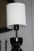 Compact and stylish table lamp showcasing a bold geometric base and clean white lampshade.