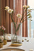 Tall glass vase for decor.
