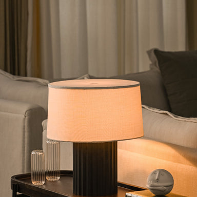 Origami table lamp in the living room setup.