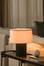 Origami table lamp in the living room setup.