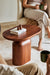 Oblong side table with a modern design.