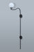 Sophisticated black metal wall lamp with a spherical white lampshade, perfect for creating a cozy ambiance