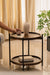 Brown wood side table with lower storage, styled in a cozy living space.