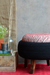 Amour Ottoman - Red / Black / Old tyre, teak wood, rope, and fabric / Dia: 23’’ H: 17.5’’ - Furniture