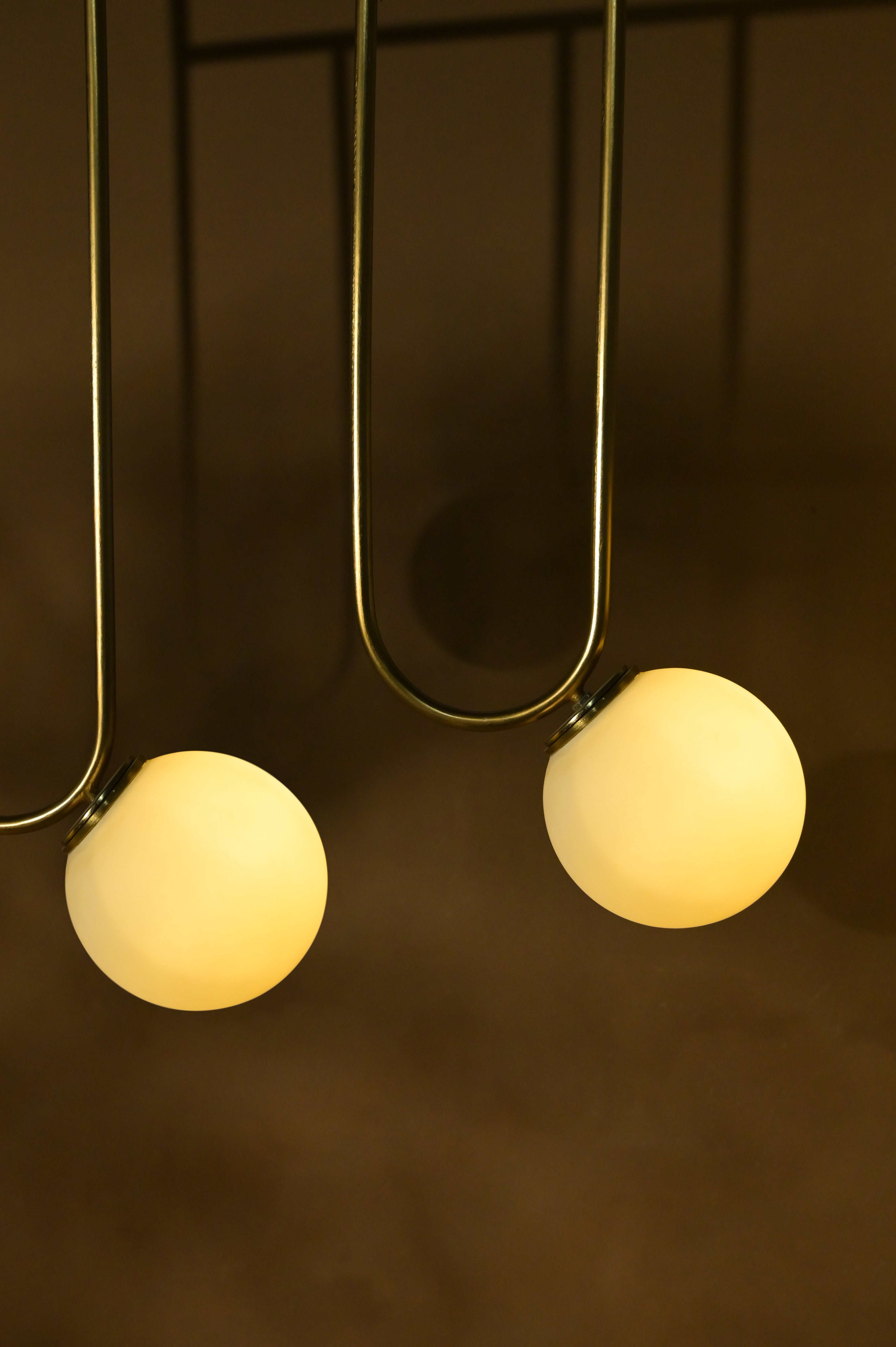 Aure Chandelier - L:55 x W:6 x H:49 In inches / Metal - Lighting