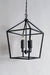 The candelabra lights of the pendant exuding a soft, candle-like glow, creating an ambiance of elegance and refinement.