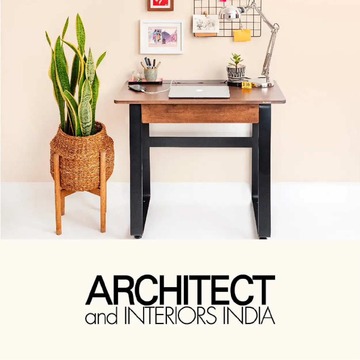Wooden desk with black metal legs and a single drawer, featuring a sleek modern design.