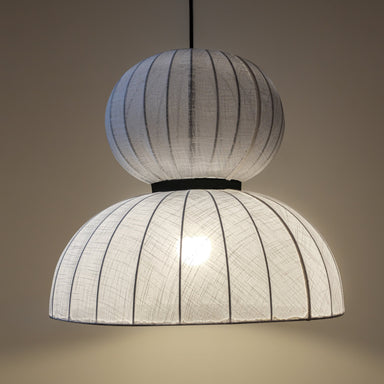 White fabric lampshade crafted from premium cotton linen, enhancing interior aesthetics.