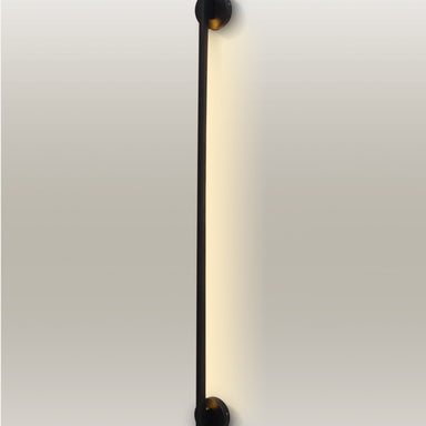 Minimalist LED linear wall lamp with a slender design and warm glow, enhancing a modern room's ambiance