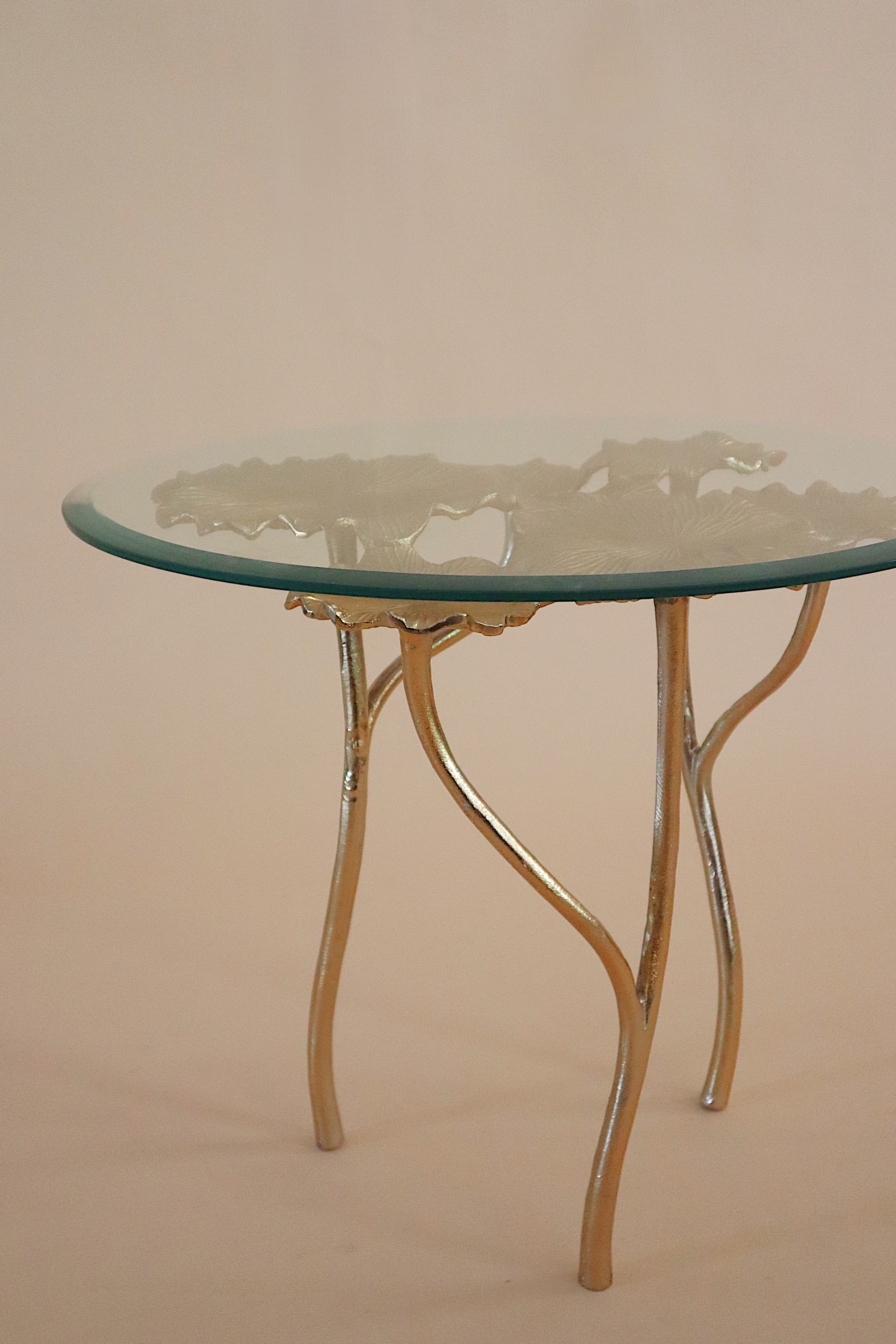Nelumbo Table - Dia 25’’ x H 20’’ / Brass plated Aluminium, Glass - Coffee Table