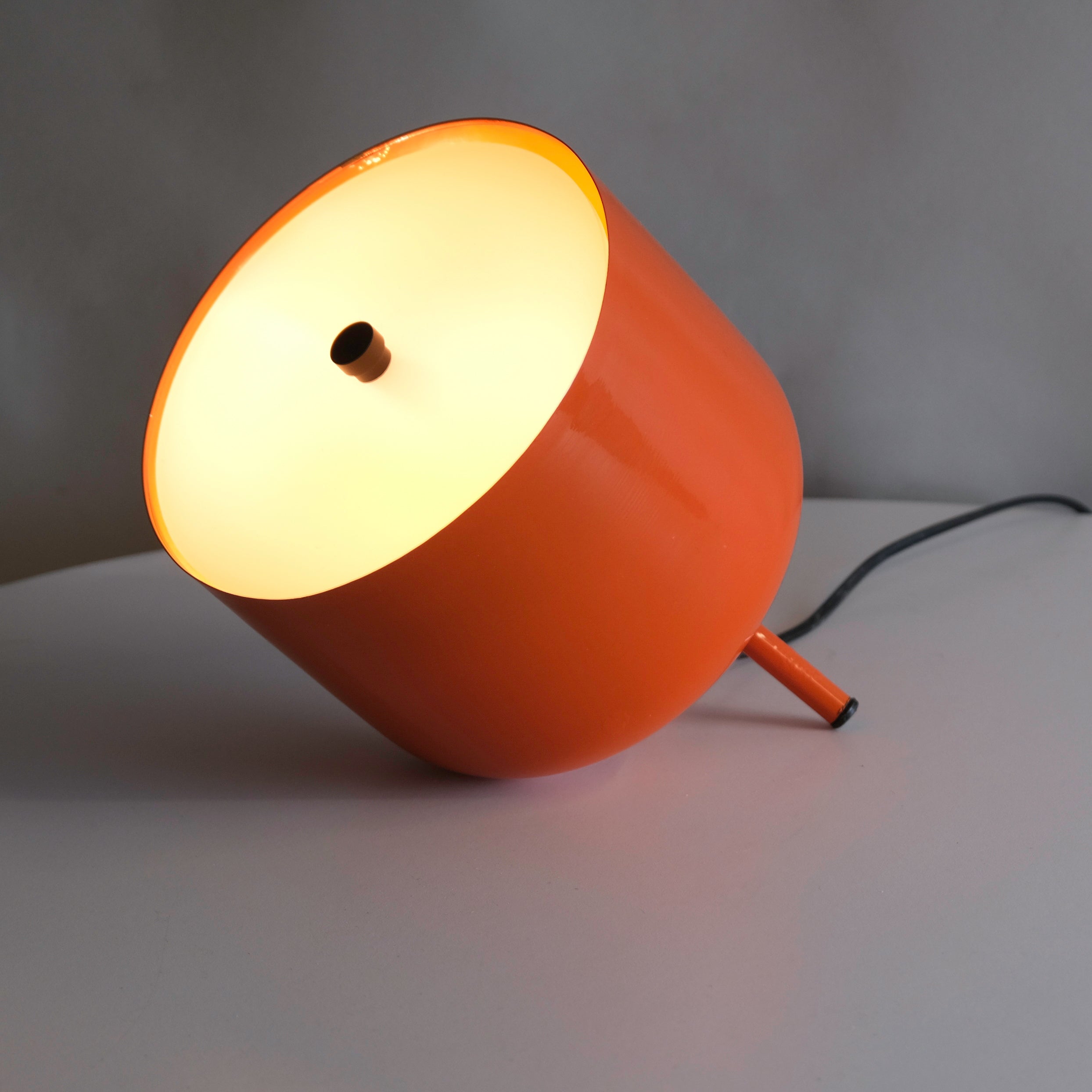 this space-saving lamp adds a pop of color and style orange lamp console table