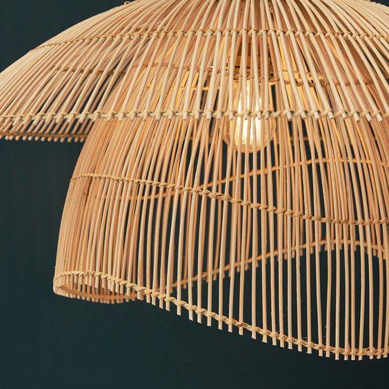 Wicker pendant light with a dark background
