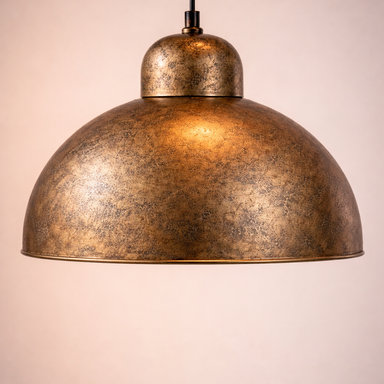 Bronze pendant light on a plain background