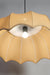 Adjustable cord fabric pendant light with a beige shade, ideal for versatile interior d√©cor needs