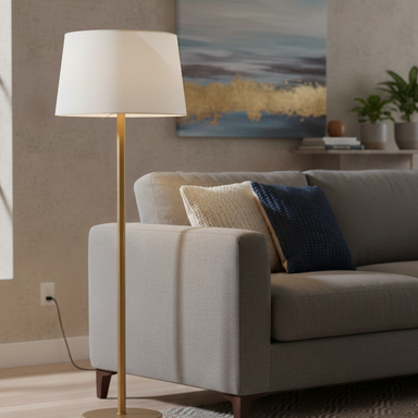 Living room with a gray sofa, floor lamp, and abstract painting on the wall.