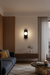 The Eclipse Wall Sconce - Black / 5 x 5 x 12 inches / Stained Black Glass, Frosted - Lighting