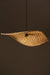 Thin wavy bamboo hanging lampshade handcrafted with elegant curved weaving, offering a warm ambient glow and a modern eco-friendly décor aesthetic.