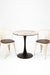 Tulip Metal Table with Tolix Chairs with Arms - Table:Dia: 30’’ H: 30’’ Chair Chair L:16 W: 16 H 36 SH 18 / Black