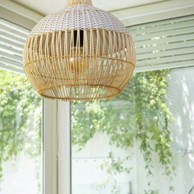 CaneCraft Illuminare: Sustainable pendant lamp with woven cane design