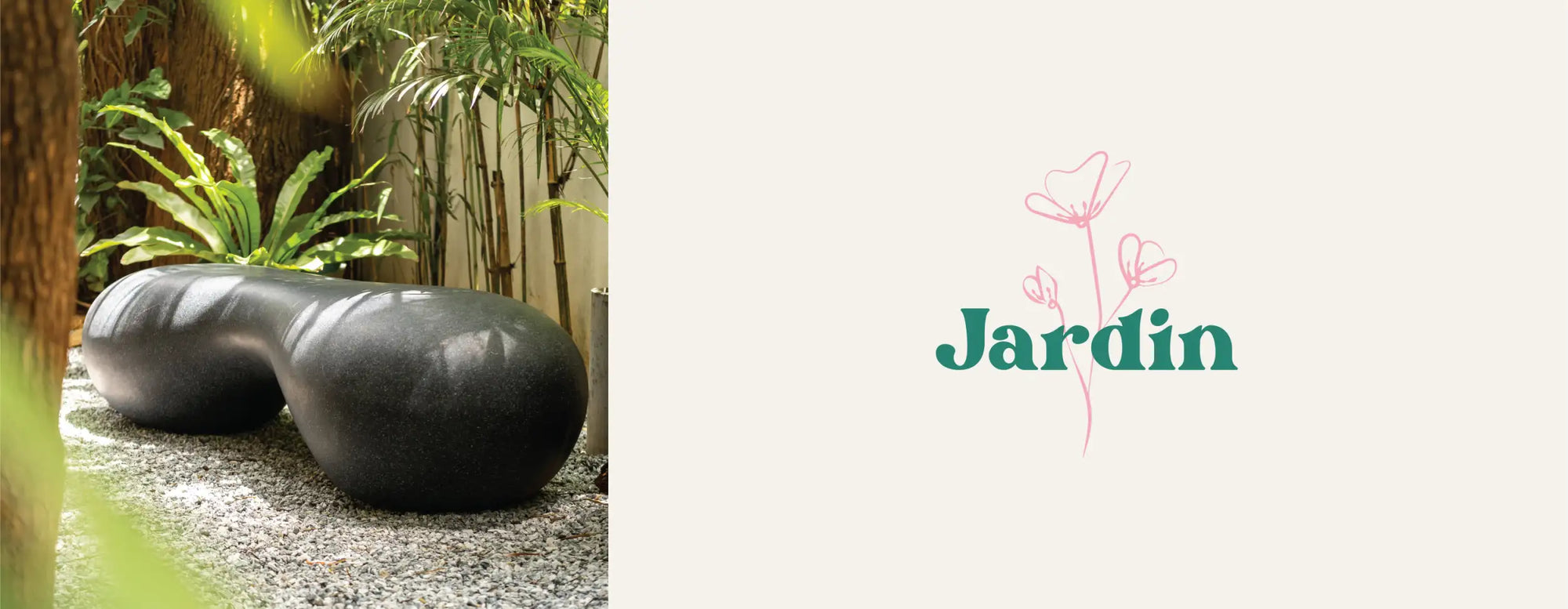 Black, smooth, organic-shaped stone bench