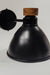 A sleek black wall-mounted lamp with a conical shade and a wooden knob on top, attached to the wall via a horizontal arm and round base. The lamp exudes a modern minimalist aesthetic, perfect for contemporary interiors.