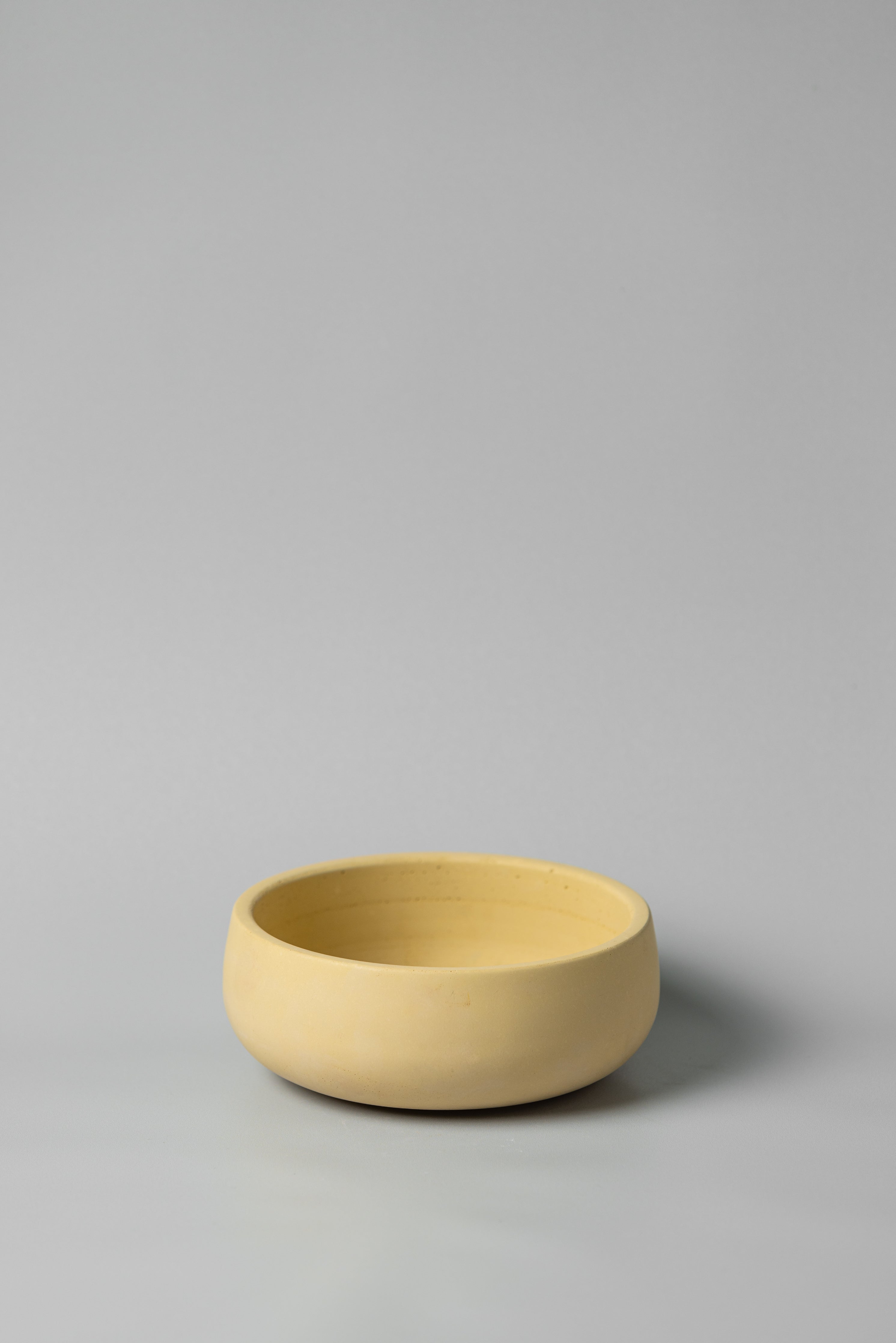 Concrete yellow bowl