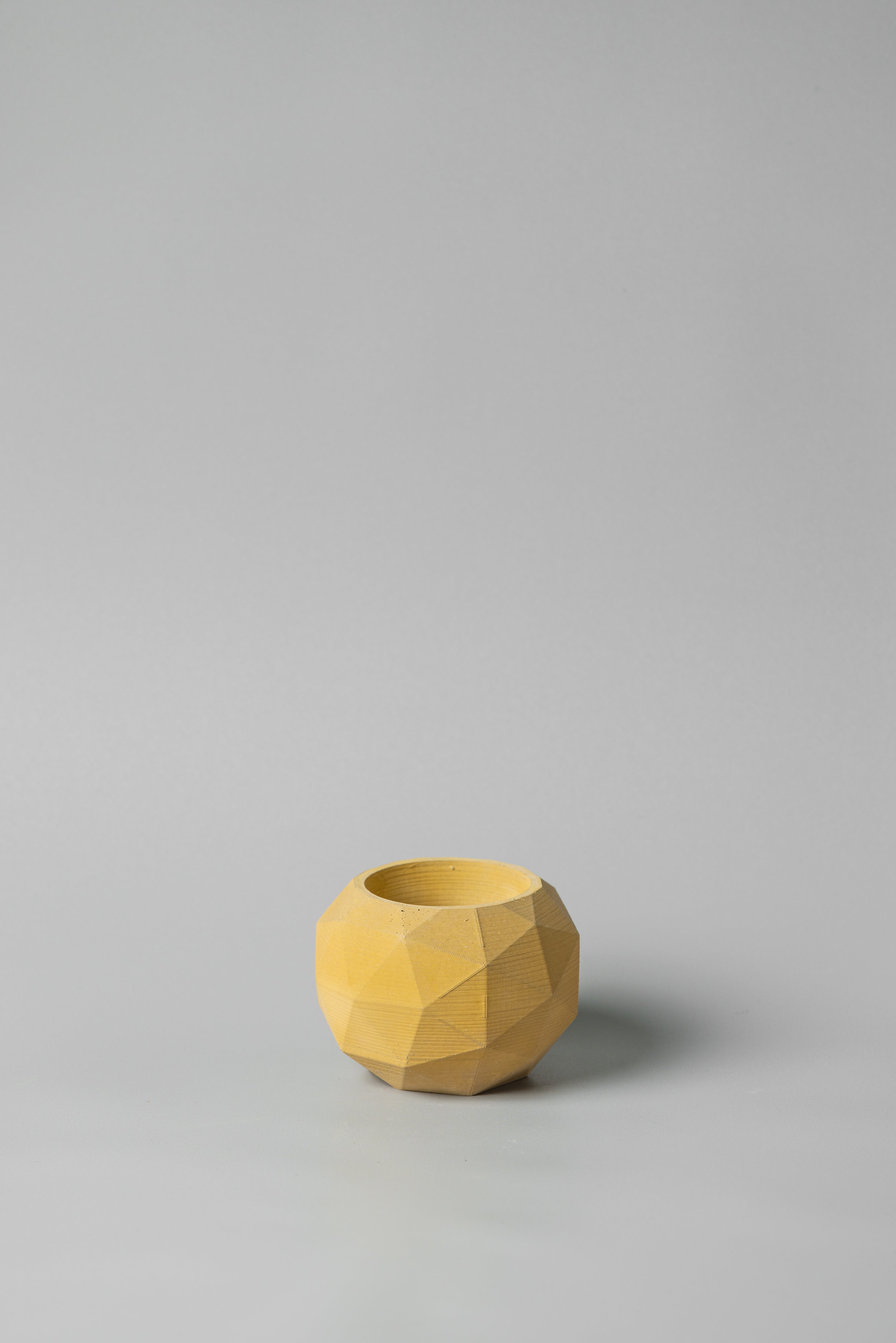 Scoop concrete planter accent in yellow