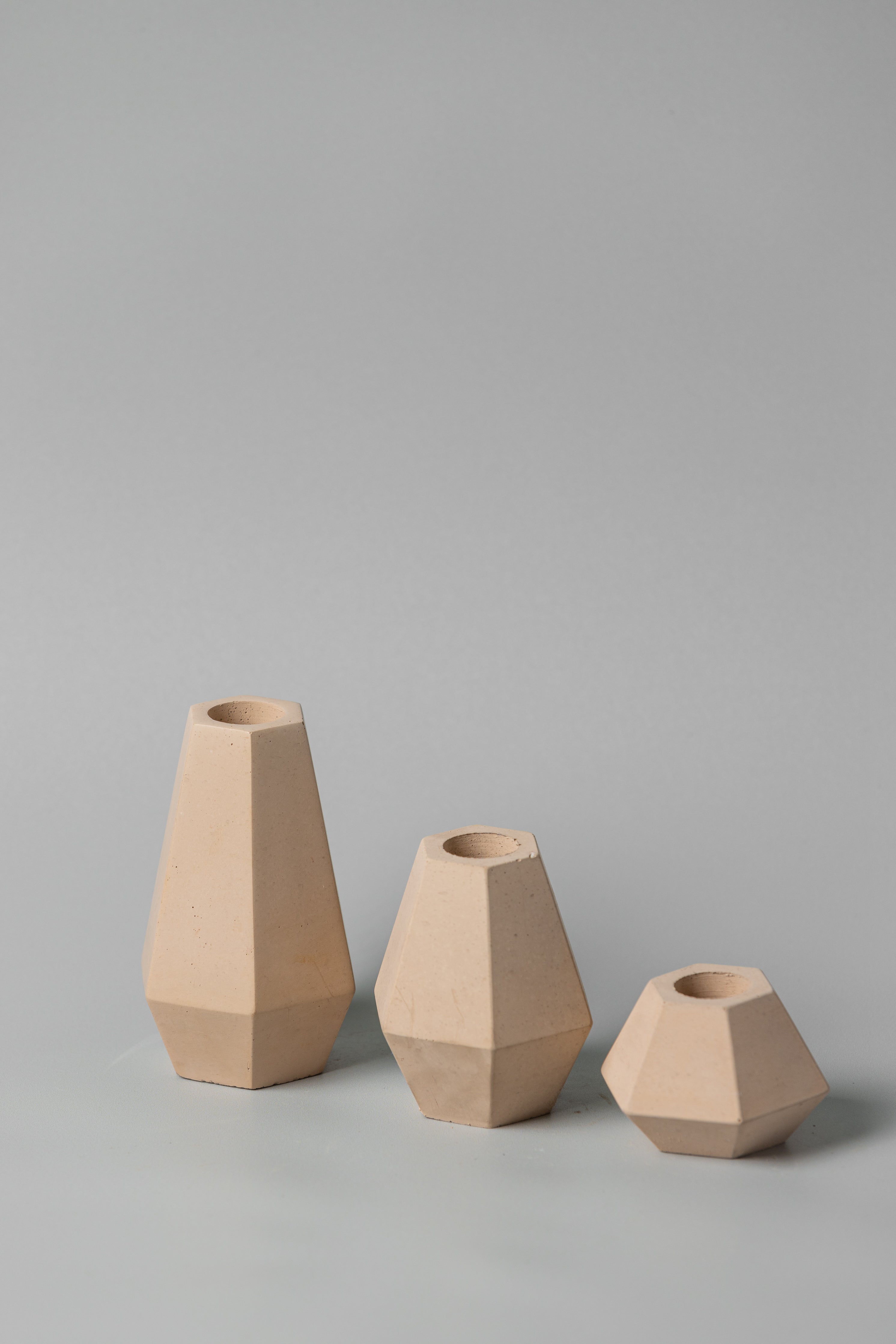 Skandle concrete candle holders in beige