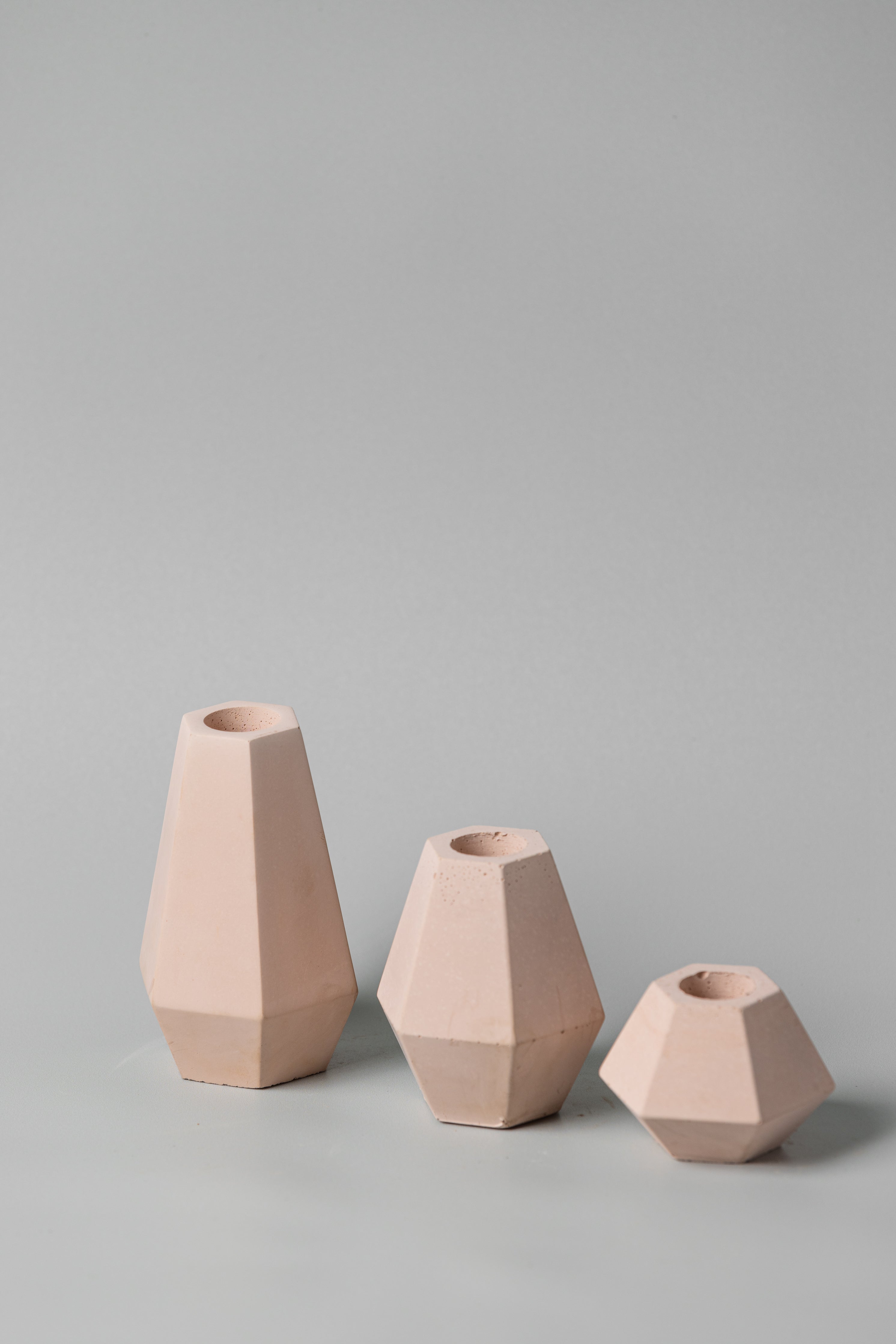 Skandle concrete candle holders in pink